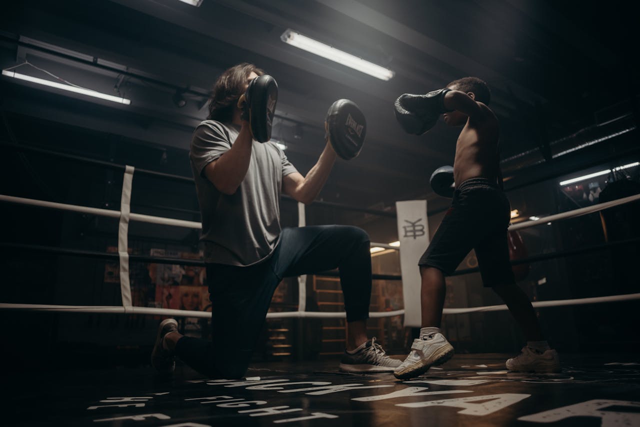 2 Men and Woman Doing Exercise